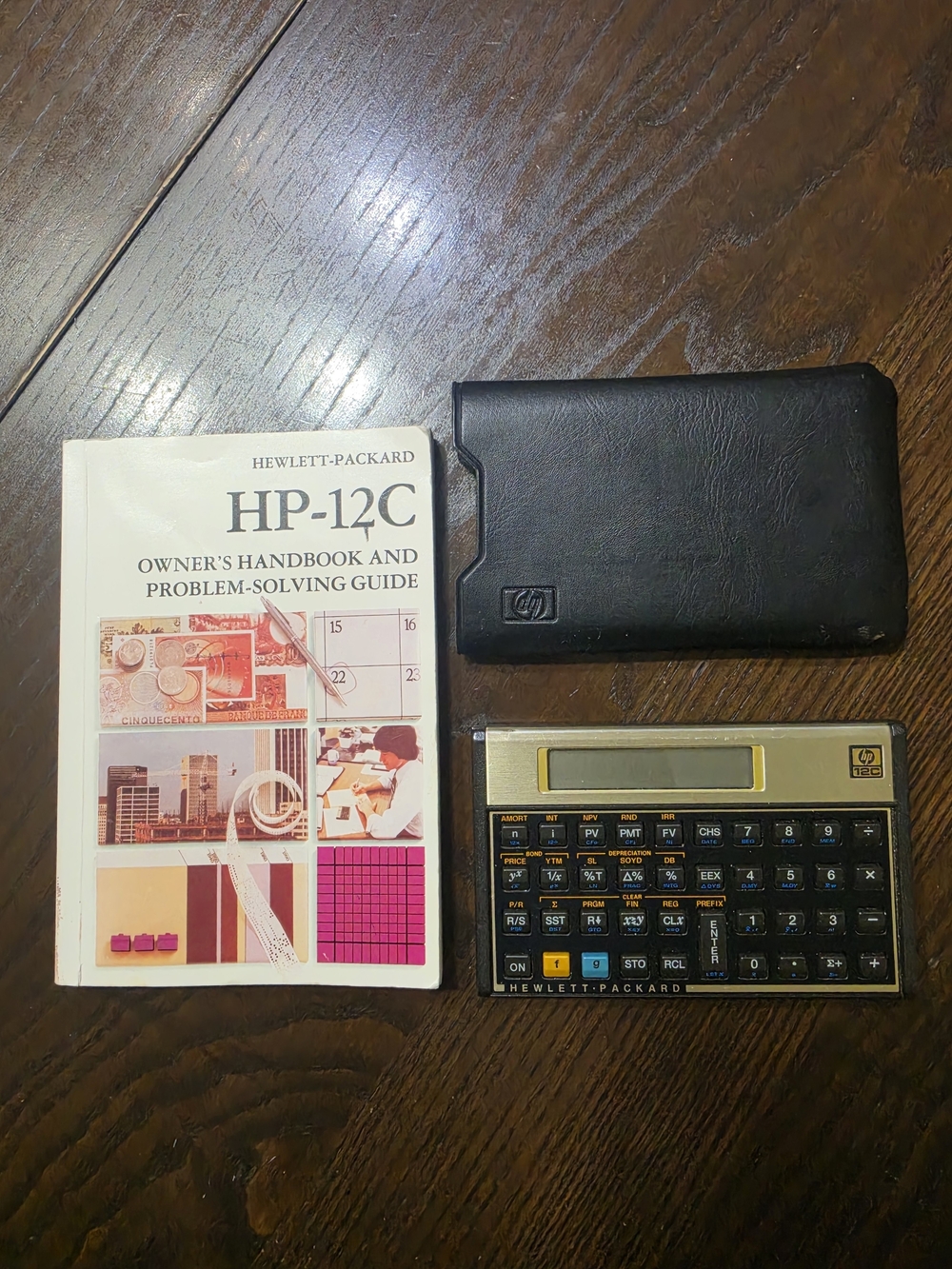 Hewlett-Packard HP-12C Financial Calculator with Manual